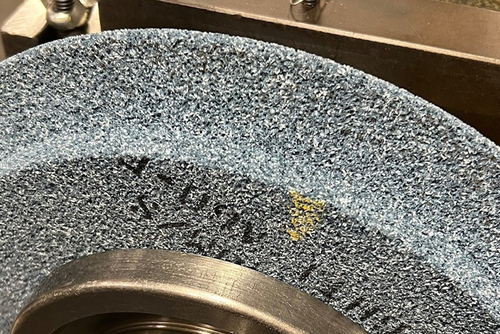 Open-porosity vitrified bonded grinding wheel after grinding with no visible loading
