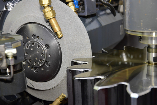 Gear tooth profile grinding wheel in a gear grinding application