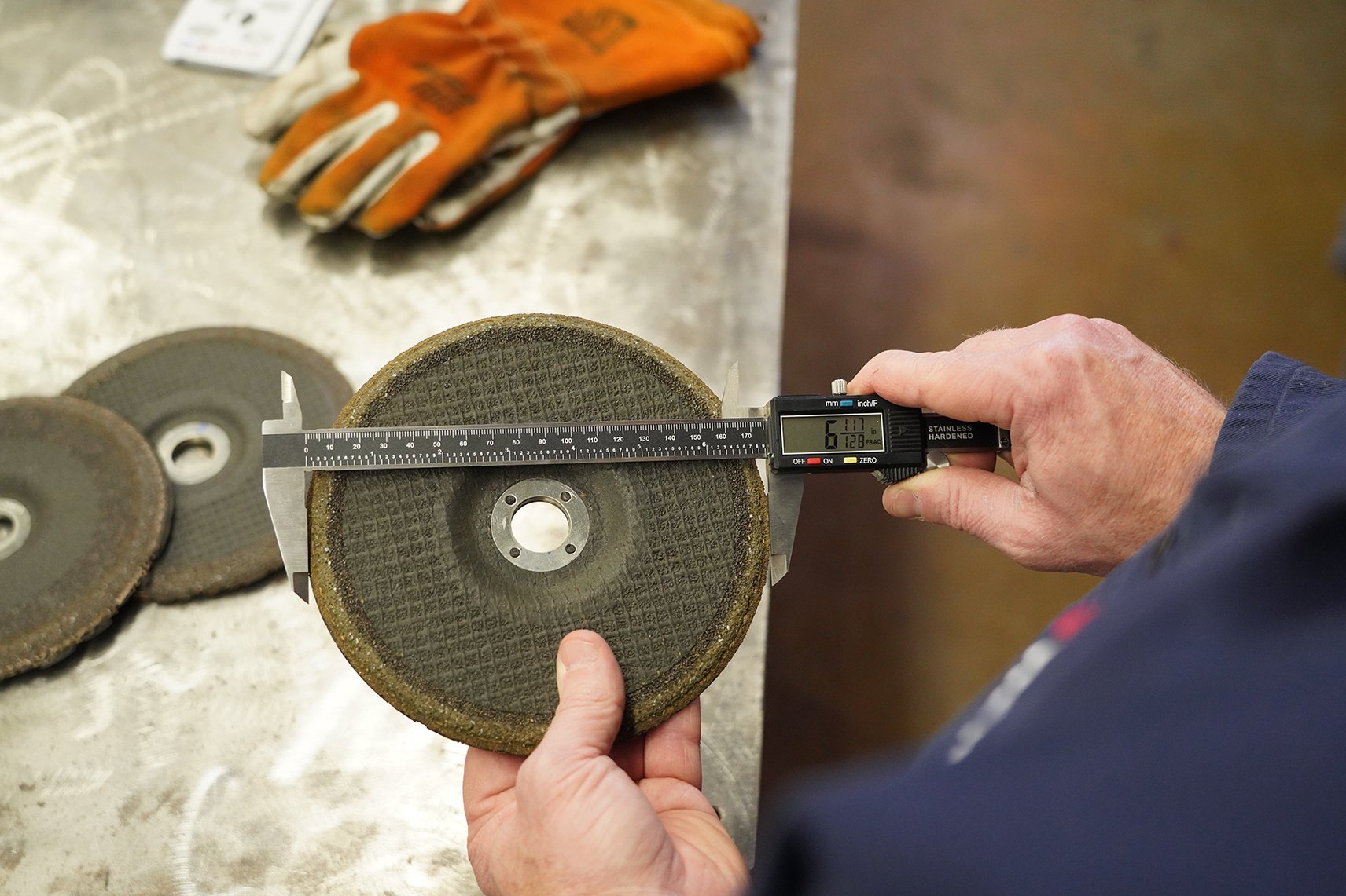 Measuring a grinding wheel to collect data